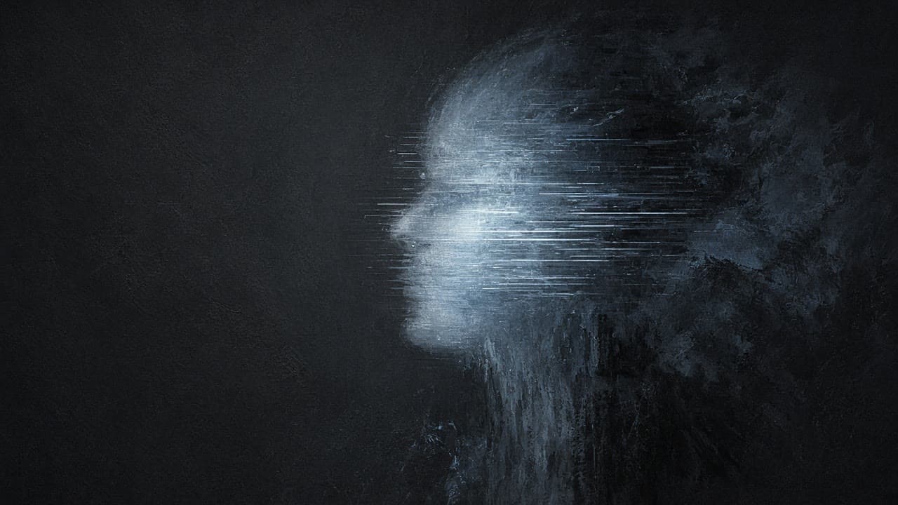 A translucent luminous face silhouette forming from cold scan-light over graphite void